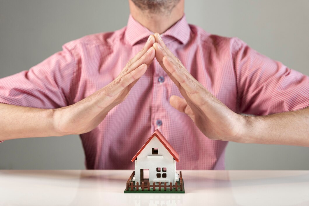 person-creating-roof-house-with-his-hands_23-2148301712